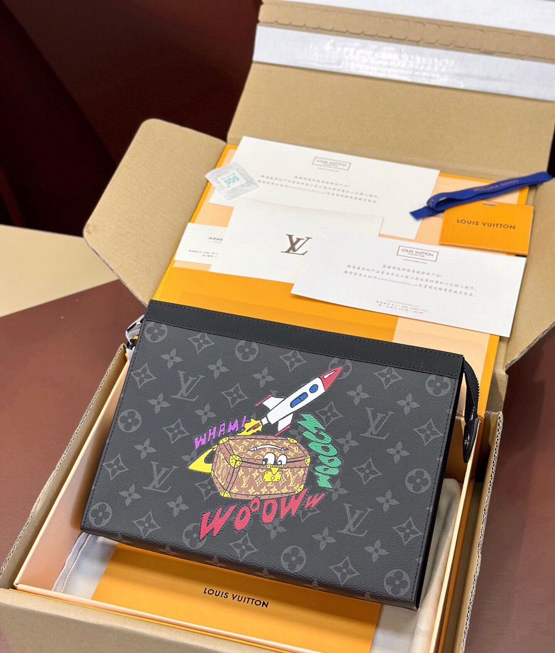 Louis Vuitton black cartoon logo bag