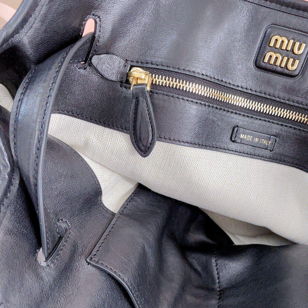 Miu Miu Aventure crna