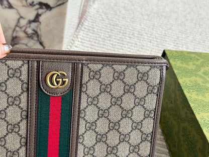 Gucci ophidia large gg supreme pouch clutch