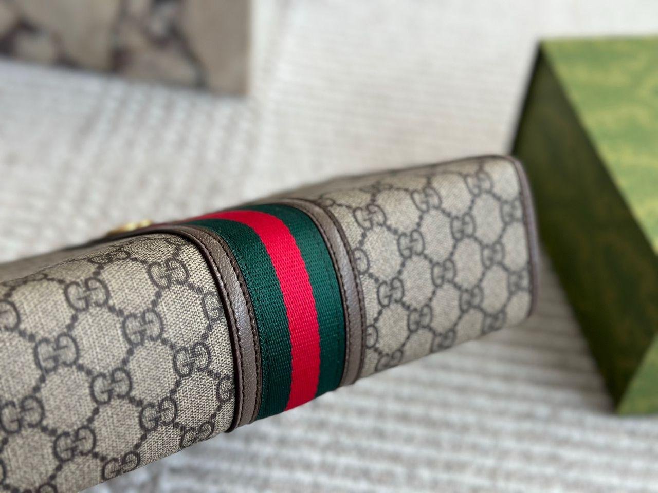 Gucci ophidia large gg supreme pouch clutch