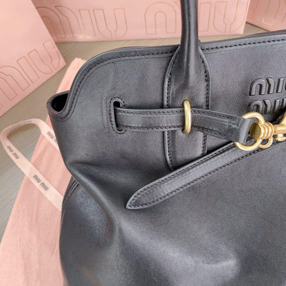Miu Miu Aventure crna