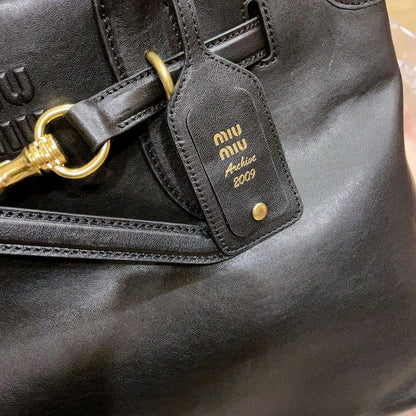 Miu Miu Aventure crna